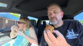 eating-banana-muffin-in-the-truck.webp