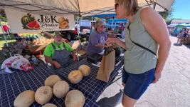 01-jk-produce-stand-cantaloupes-on-table.webp